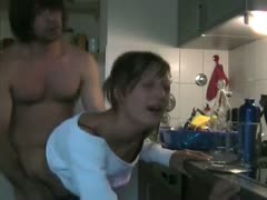 Cute blonde wife with short hair gets hardcore sex and a tongue cumshot in the kitchen